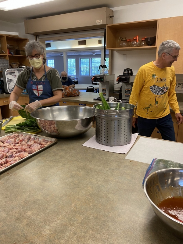 Volunteer Serving Saturday Hot Meals